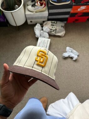 Cream Pinstripe Hat with Yellow Logo